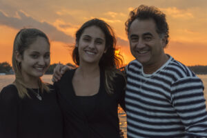 Beautiful sunset behind Gerry and his 2 daughters