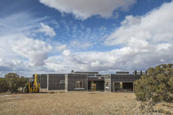 It looks like a house, but the clouds are stealing the show.