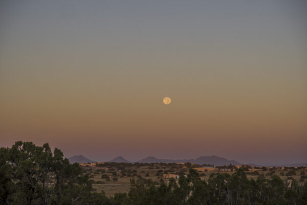 Moonset at sunset.