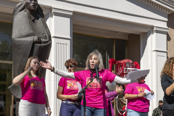 Cindy starting a chant.