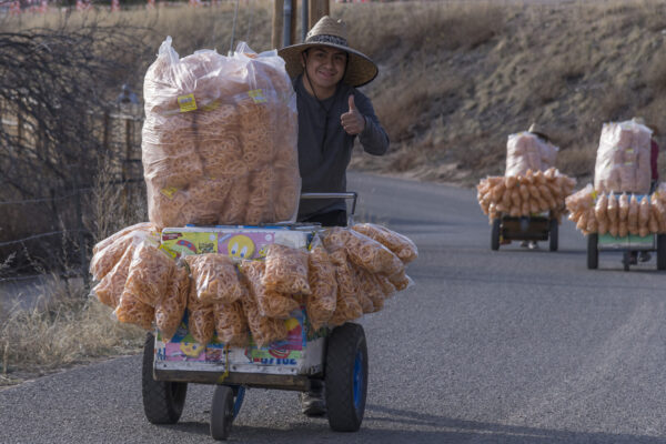 Pedro is happy. He worked in the kitchen all night and will be happy to sell his goodies