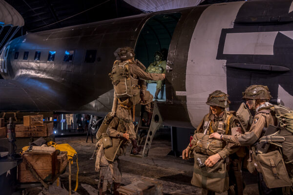 Parachuts boarding an original plane at the Museum Airborne in Sainte Mère Église.